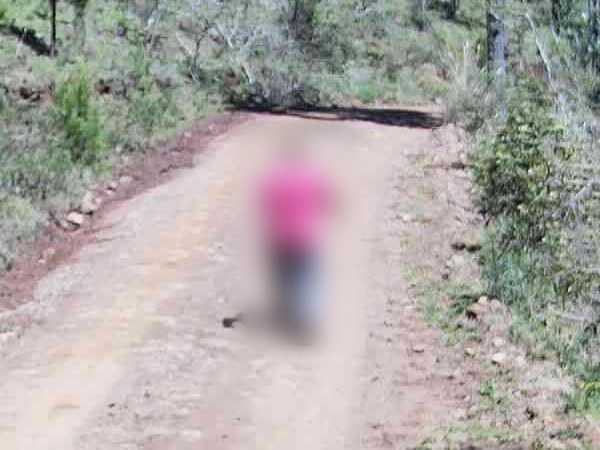 Pessoa caminhando na estrada de terra, desfocada por privacidade, com a moldura “Pessoa” marcada pela IA